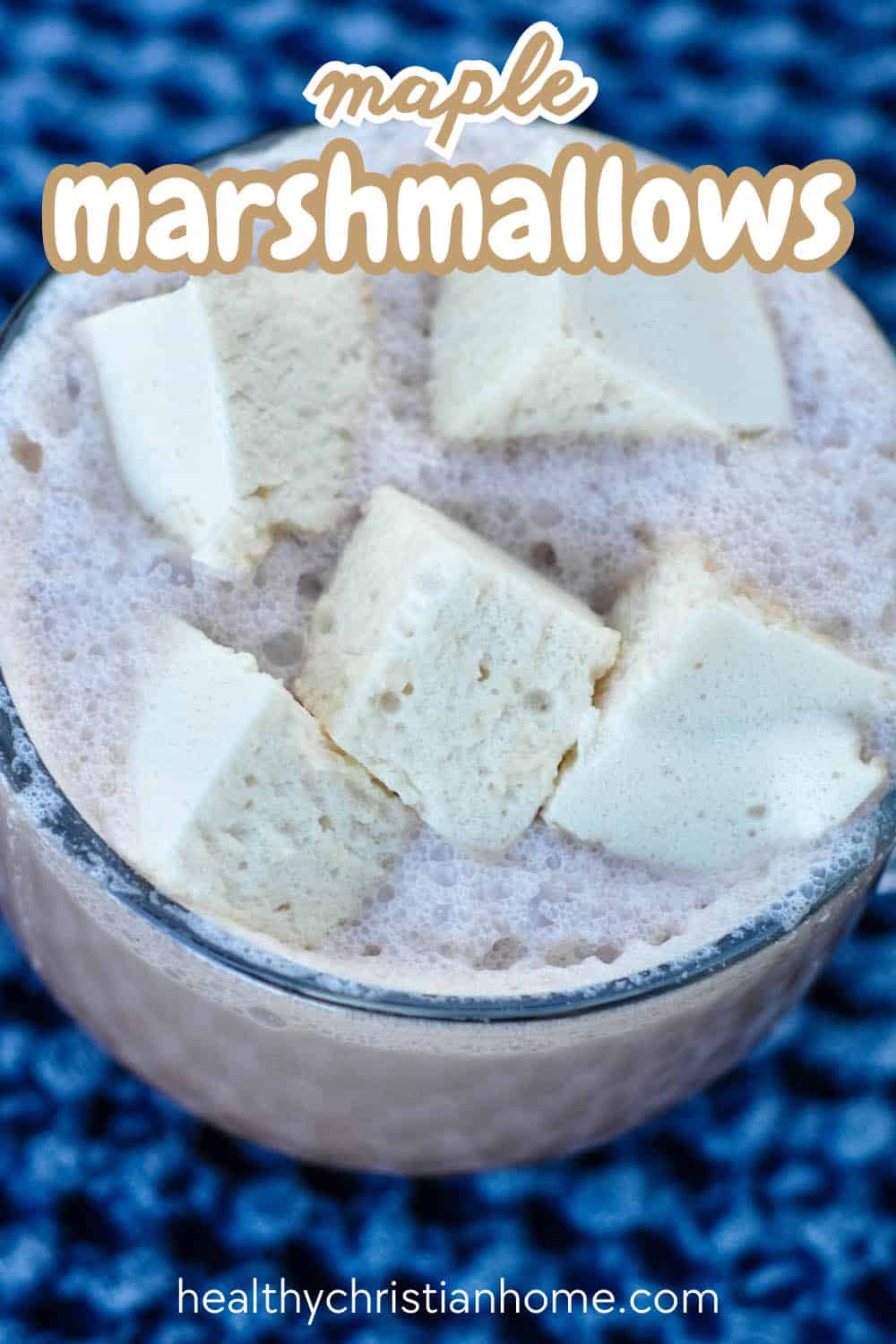 Marshmallows with marshmallow root in a mug of hot cocoa.